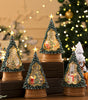Decorative Christmas tree lights with glowing interiors on a festive background.