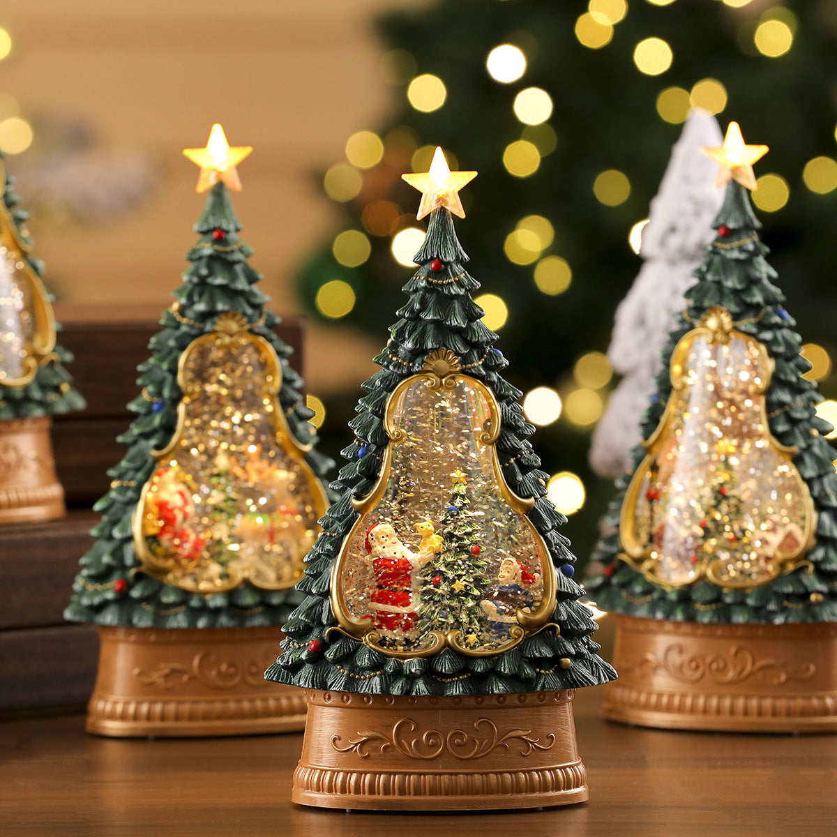 Decorative Christmas trees with glowing interiors on a wooden surface, blurred lights in the background.