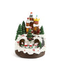Decorative Christmas village scene with houses, trees, and figures on a white background