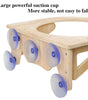 Wooden structure with large suction cups on a white background