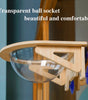 Transparent ball socket with wooden frame against a blurred background