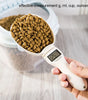 Pet food measuring scoop showing accurate weight