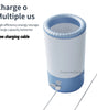 Blue and white pet paw cleaner device with charging cable on a light blue background