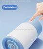 Pet foot washer with a hand pressing a button on a blue background