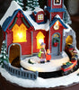 Decorative Christmas scene with a house, children, and a train on a dark background