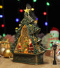Decorative Christmas tree with Santa Claus and snowman figures inside, surrounded by festive lights and ornaments.