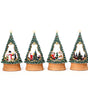 Four decorative Christmas tree figurines with scenes inside on a white background