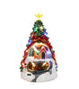 Decorative Christmas tree with lights and a house at its base on a white background