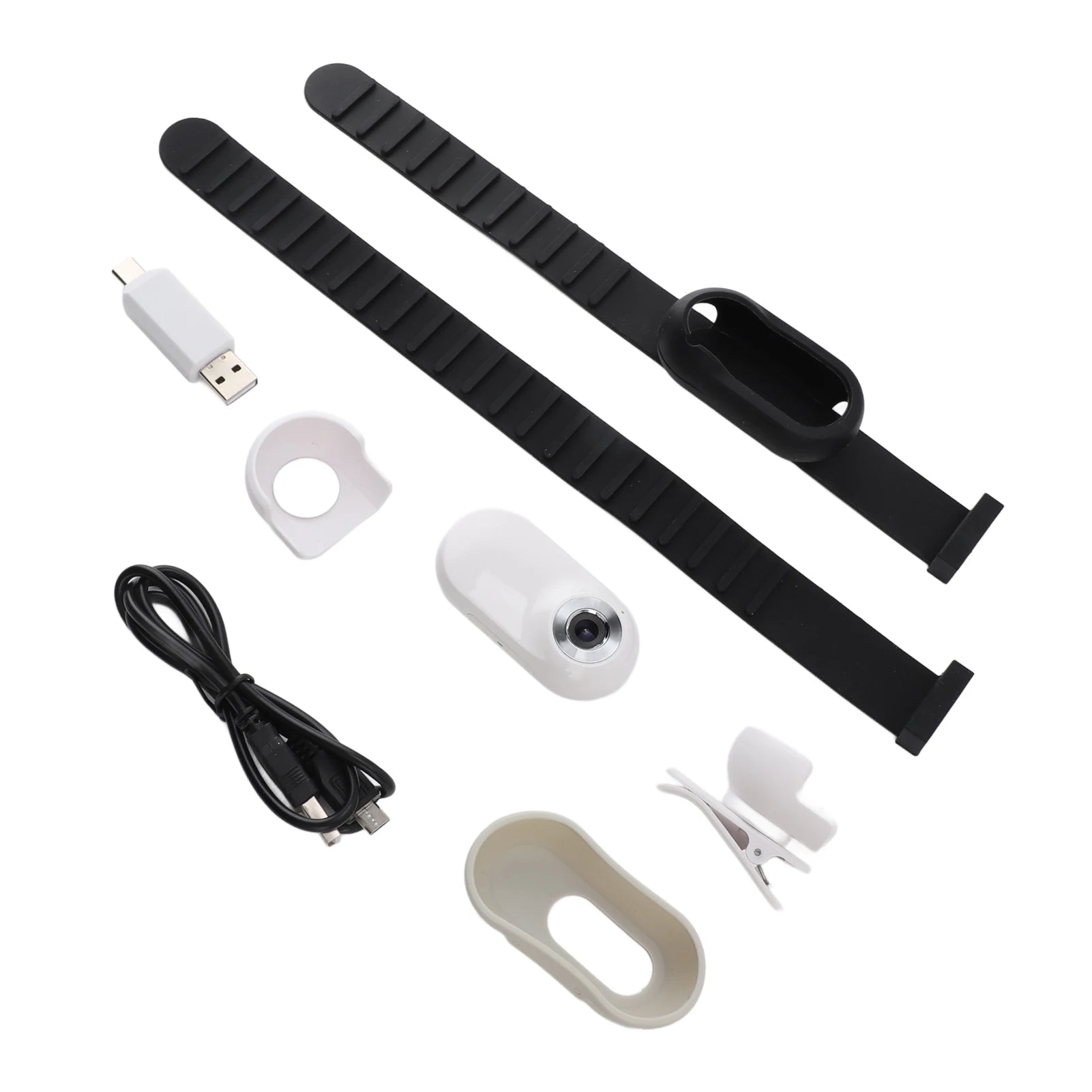 Set of pet camera components including a black strap, USB cable, and other parts on a white background