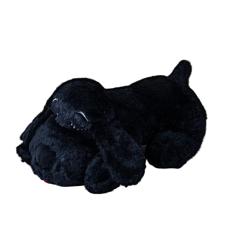Black calming plush toy resembling a dog with a red heart above it on a white background, 