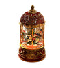 Decorative snow globe with a carousel scene on a white background