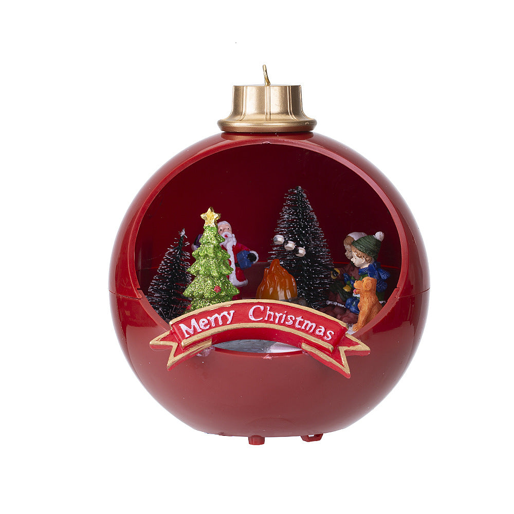 Red Christmas ball with a festive scene and 'Merry Christmas' banner on a white background