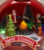 Christmas-themed ornament with Santa Claus, trees, and a family around a campfire, featuring a 'Merry Christmas' banner.