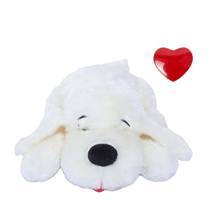 White plush calming dog toy with a red heart on a white background
