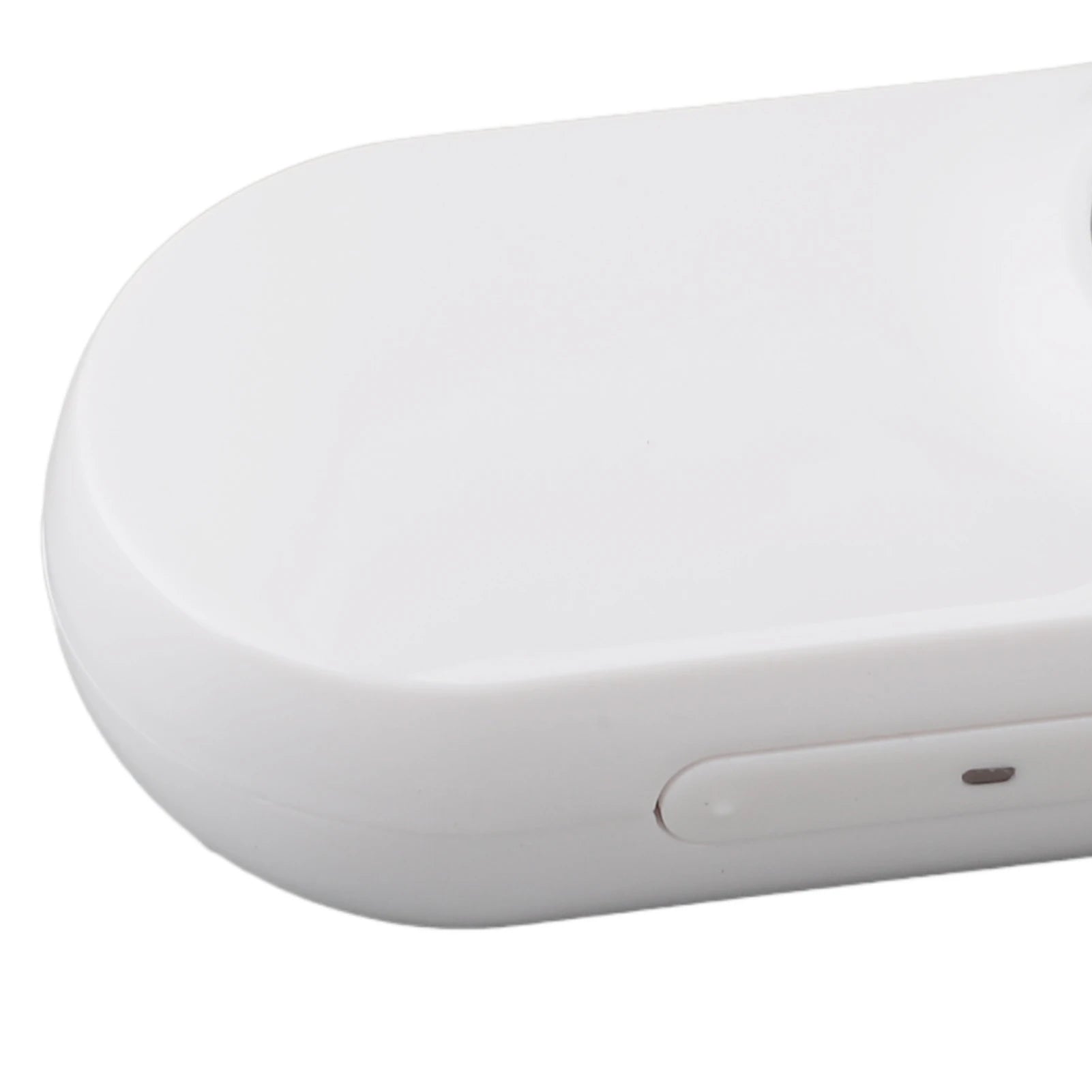 Close-up of a white electronic device on a white background