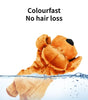 Brown teddy bear with water splash and 'Colourfast No hair loss' text on a white background