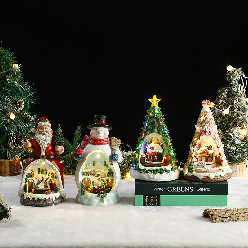 Decorative Christmas snow globes on a snowy surface with a dark background